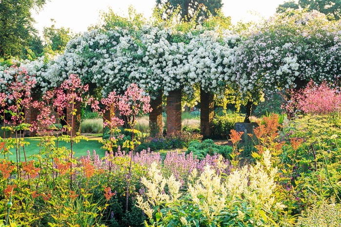 Waltham Place is an English ornamental landscape garden with splendid specimen trees