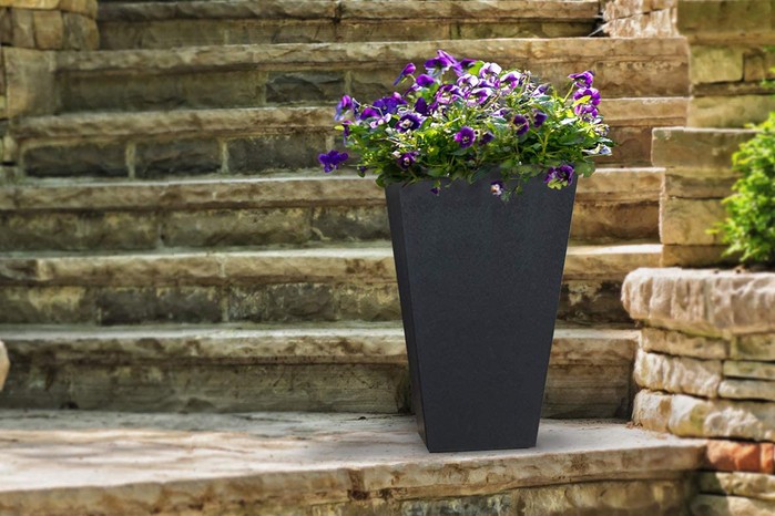 ECO GARDEN 50cm Sonata Recycled Rubber Plant Pot on stone steps
