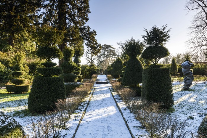 The main vista through the topiary garden was designed to focus on the parkland trees and make them part of the garden. The yew topiary was moved from the walled garden and replanted in 2011. It is now framed by a low hedge of Euonymus alatus ‘Compactus’.