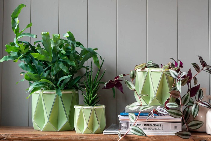 Origami Self Watering Eco Plant Pots on a shelf