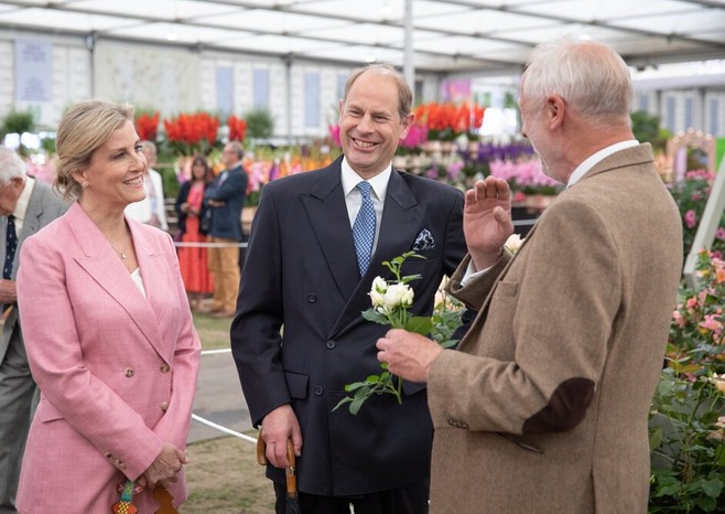 Britain's Prince Edward and Sophie the Countess of Wessex talk with Philip Harkness at the Harkness Roses exhibition stand during a visit to the RHS Chelsea Flower Show in London,