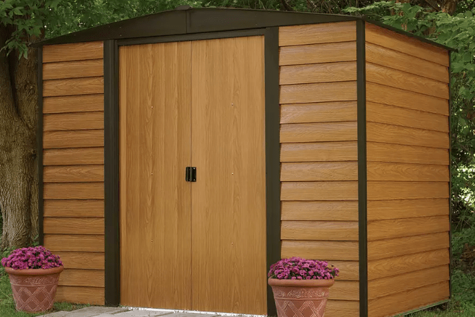 Wood panelled metal shed