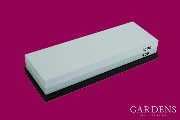 Vogue Dual Grit Whetstone on a pink background